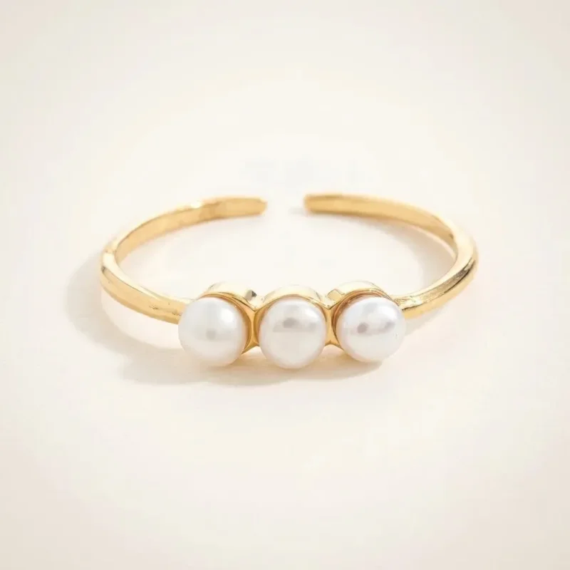 Anillo Tres Piedras Dorado